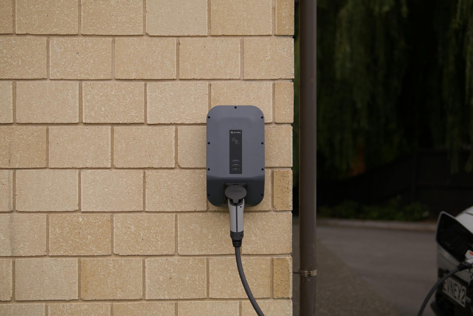 an electric car charger on a wall